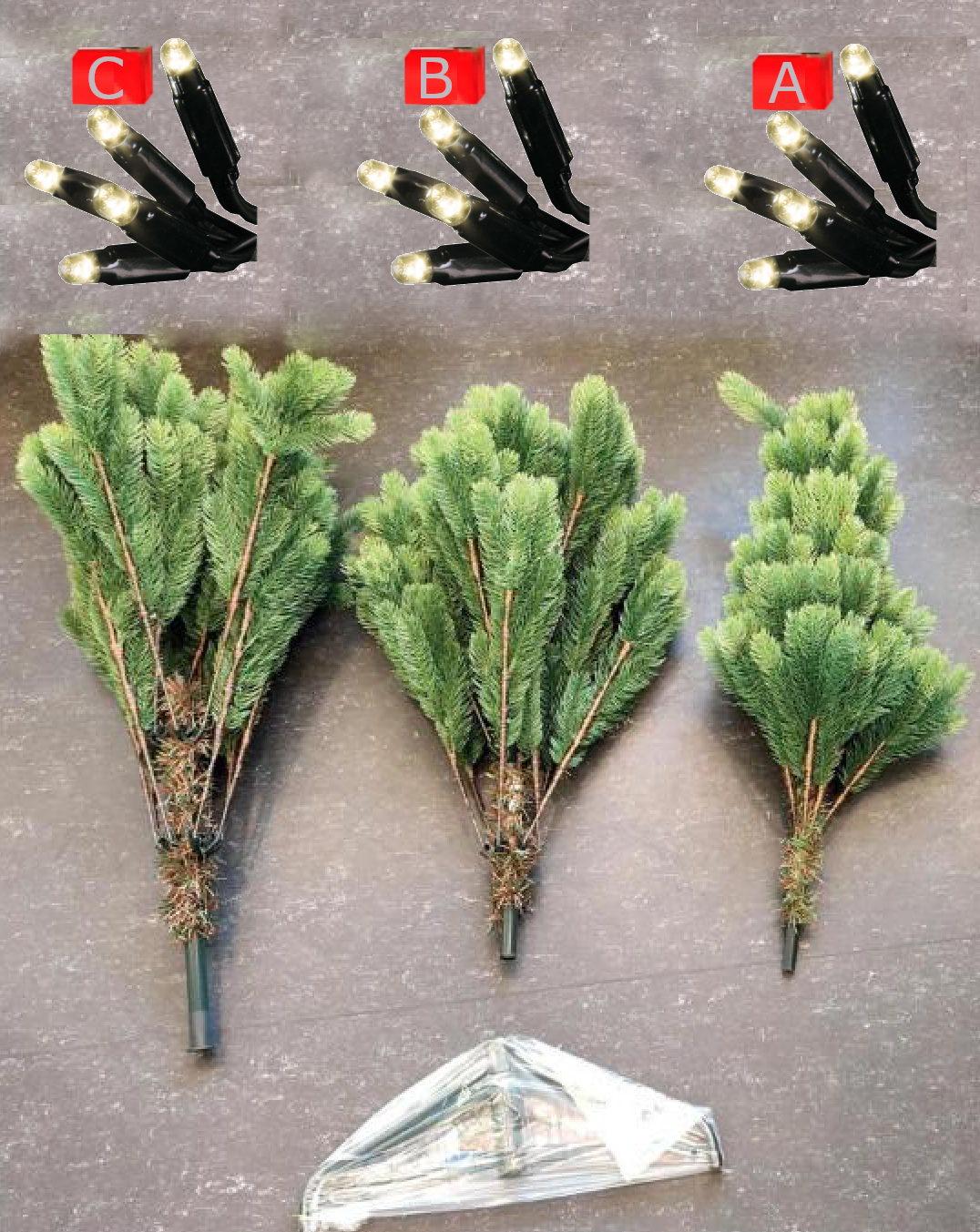 Lieferumfang: Baumsegmente, Ständer und LED-Ketten (A/B/C)